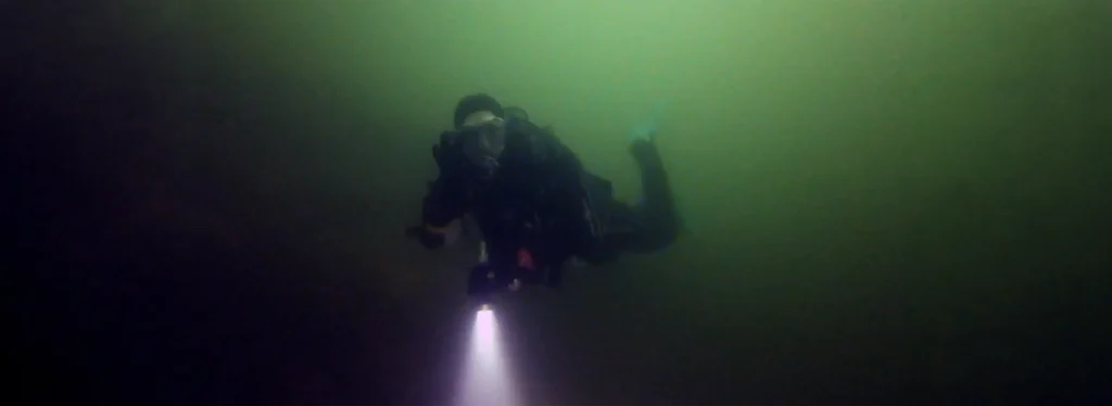 Yvonne at lake Starnberg, Bavaria on a night dive