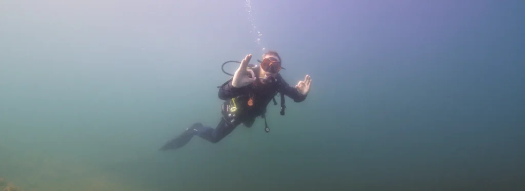 Phil Anderegg, SSI Instructor, at Sinninger Weiher in Germany with low visibility