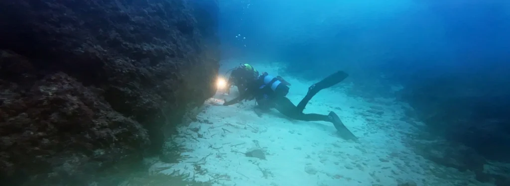 Scuba diving instructor Roland Bach and a student in Menorca, Spain