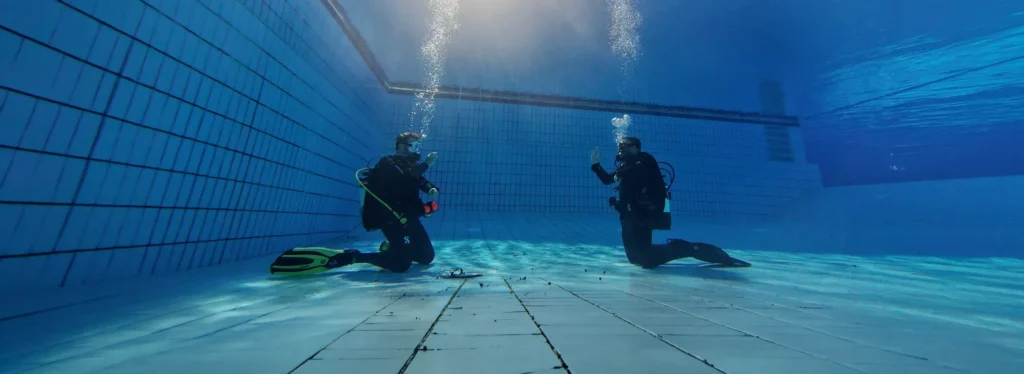 SSI Diving Instructors Phil and Adreas practicing Skills in a pool