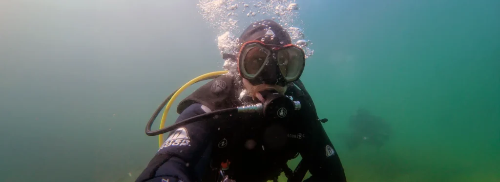 SSI Instructor Phil diving at Echinger Weiher, Bavaria